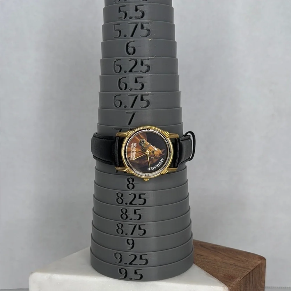 Vintage Affirmed Black and Gold Watch with Horse Design lot W2